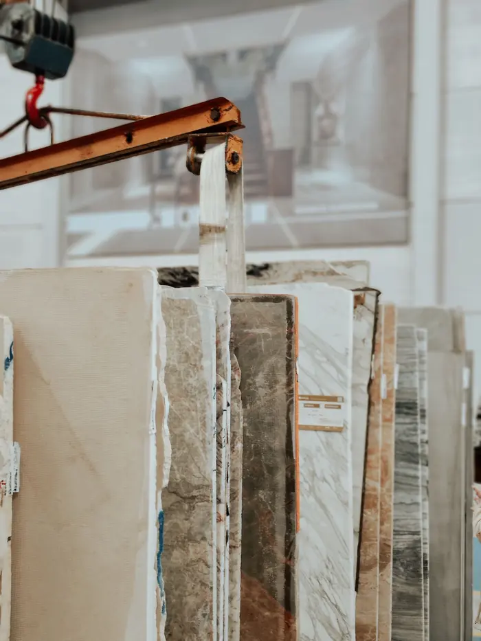 Marble and granite slabs stored upright in an A-frame rack